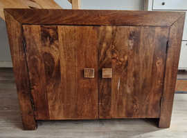 Brown solid wood sideboard cupboard.