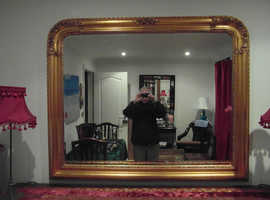 Stylish vintage mirror in ornate frame