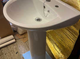 Pedestal basin with taps
