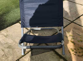 Two folding camping chairs