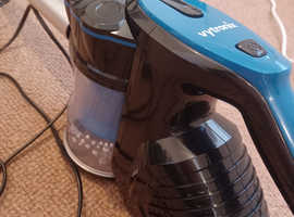 Corder and hand held vacuum cleaner