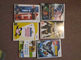 Nintendo Wii for sale, including 6 games.