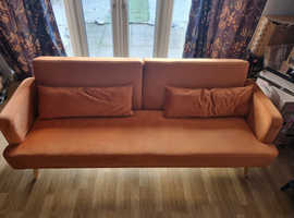 Sofa bed,  orange.  Really good condition