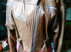 Leather 100% studded waist jackets.