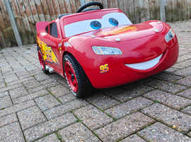 Huffy lightening McQueen ride on car