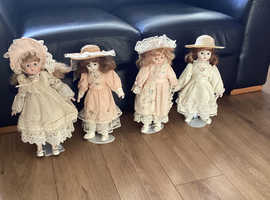 Four 16" period porcelain dolls