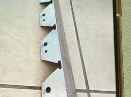 Paver and/or driveway restraints.