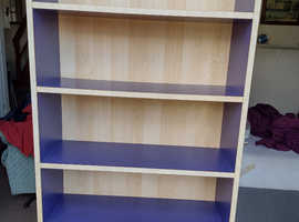 Blue Bookcase With Wood Effect Background
