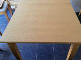 Lovely dinning table. Seats 8 to 10. Also 8 chairs.