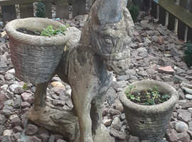 Stone donkey with planters