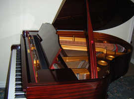 Well cared for modern John Broadwood  & Sons Grand Piano in Beautiful polyester mahogany finish.