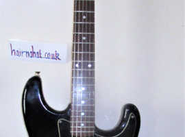 EPIPHONE.  Black Strat.  vgc cleaned serviced and setup using Good Quality Strings