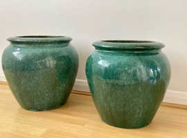 Two green garden pots