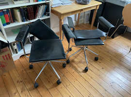 Black leather and chrome office chairs for upcycling