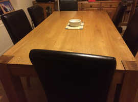 Solid Oak modern style dining table plus FREE chairs