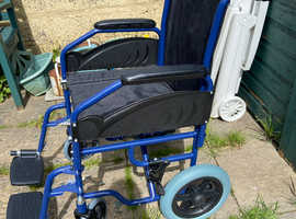 Brand new wheelchair unused half price including free £10 air cushion