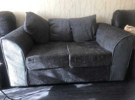 Two seater grey sofa 1 year old