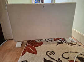 Four FUTURA Digital Panel heaters