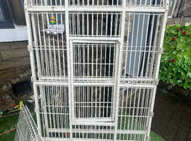 Large parrot cage for sale.