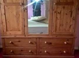 farmhouse pine hand made double wardrobe in pine double doors four base drawers and full size centre mirror great cond,