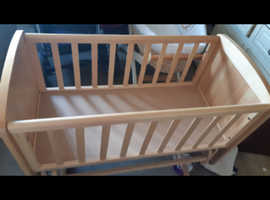 Wooden swinging baby crib