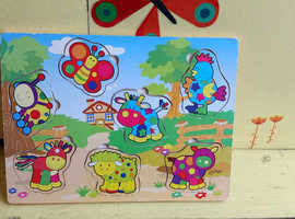 Children's wooden insect and animal puzzle