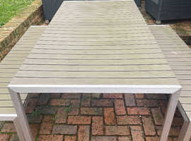 Light grey wooden effect slat table with silver legs and trim and matching two benches