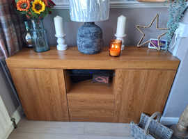 Sideboard with built in light and glass shelf