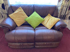 Quality leather settee and two chairs