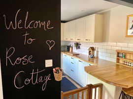 Relax with family, friends and pets in the stylish comfort of Rose Cottage...