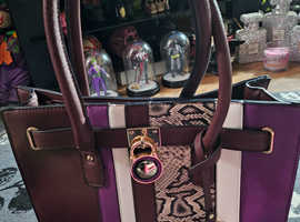 M purple white and brown bag