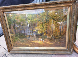 Assortment of frames prints mirror.