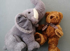 2 Soft Toys. A Lilac Elephant & a Brown Bear.