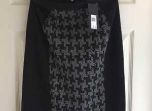 (115) Peacocks black skirt, size 10, new!