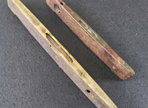 2 vintage wood and brass spirit levels