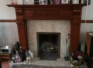 Marble fire surround, hearth, and grate