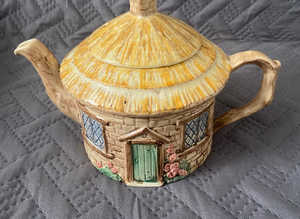 Hand painted round cottage tea pot