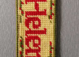 A Personalised Tapestry Bookmark with the name Helen.