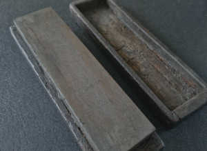 Vintage sharpening stone in wood case