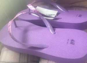 (650) H&M lilac flip flops, size 7/8, new!
