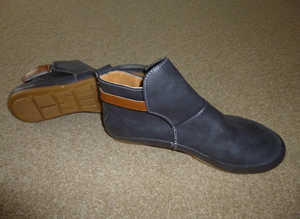 Cute leather ankle boots, grey with tan straps.
