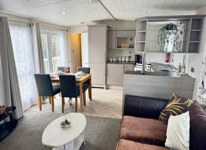 Bargain 2 Bedroom furnished caravan with decking & patio doors *** Read more ***