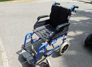 NEW CONDITION FOLDING WHEELCHAIR