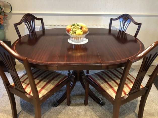 Extending Dining Table And 4 Matching Chairs In Blackpool
