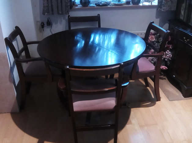 Free dining table Round extends to Oval with 6 chairs (4 with arms) in Sittingbourne