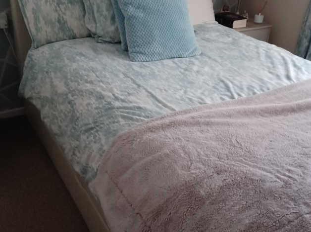 Free double cream faux leather sleigh bed style with mattress in Rotherham
