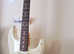 STRAT in Cream. A upgraded Squier see brief description.  Setup with Good Quality strings used