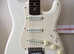STRAT in Cream. A upgraded Squier see brief description.  Setup with Good Quality strings used