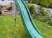 Green Plastic garden slide 3 metres long, great fun to be had...free to a good home.