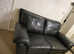 Two seater leather reclining sofa
